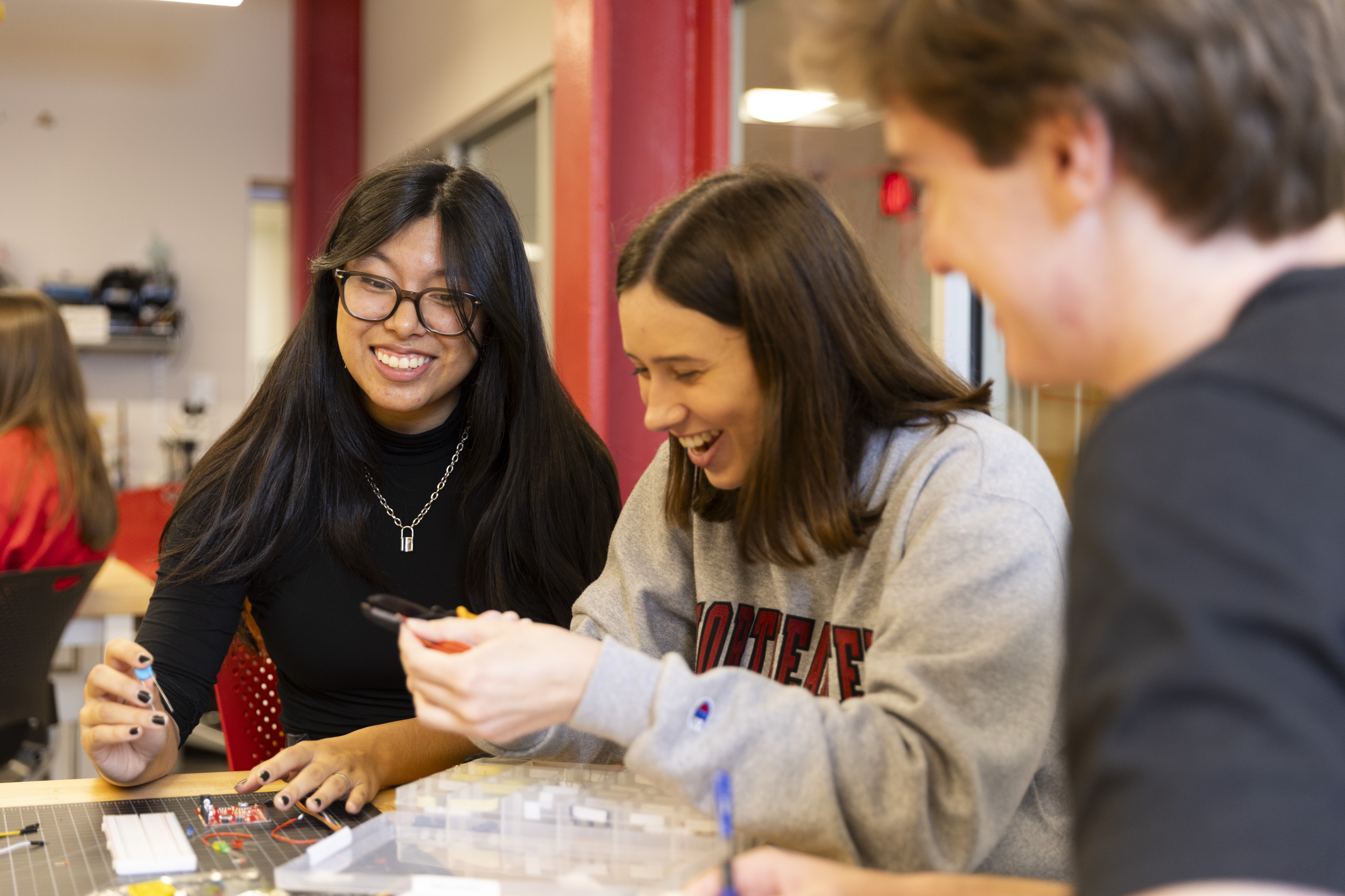 Three Generate members working together.